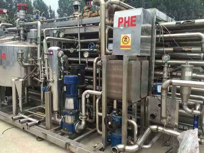 回收大型食品设备 果蔬清洗生产线,果汁厂设备